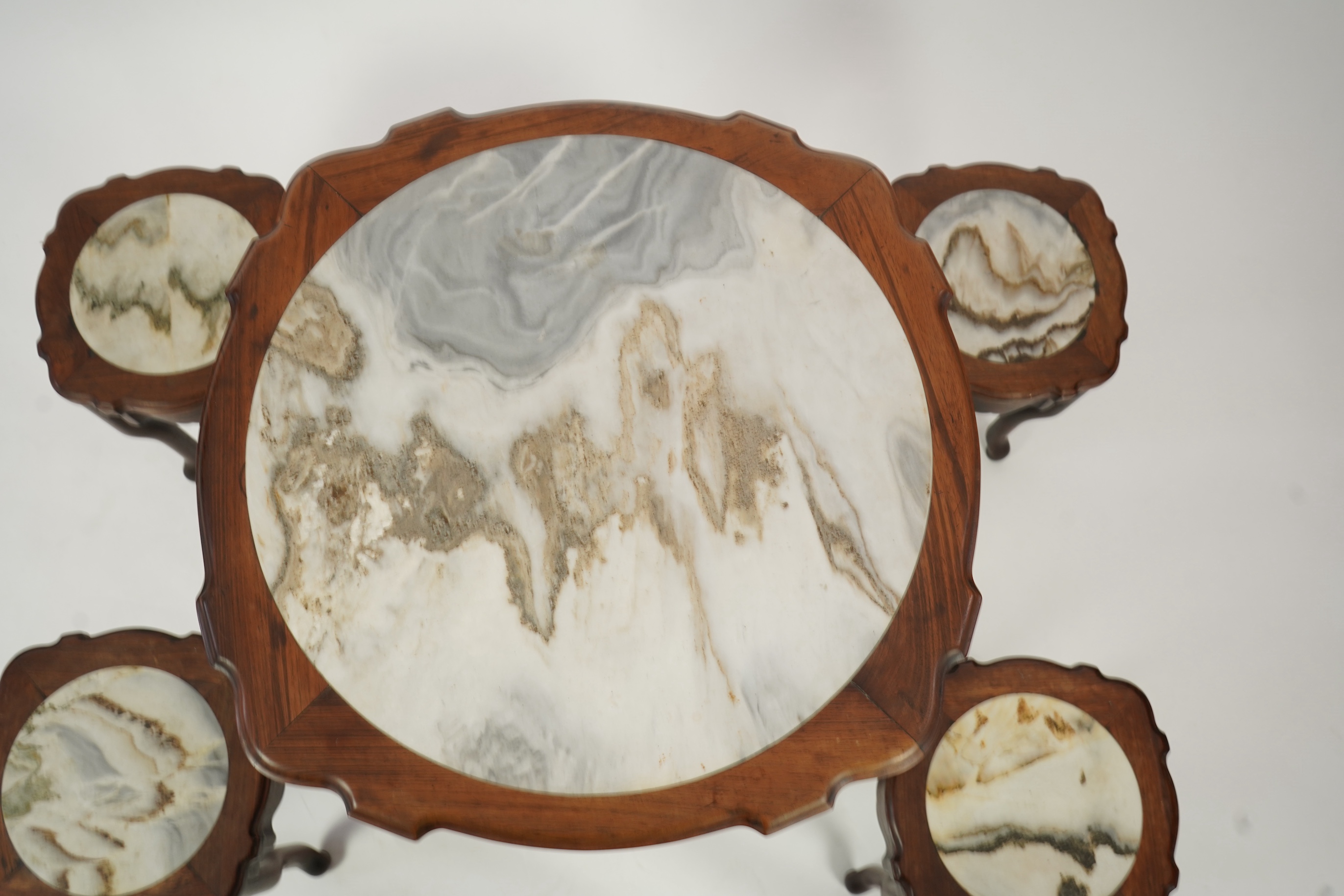 A Chinese dreamstone marble inset hongmu table and four matching stools